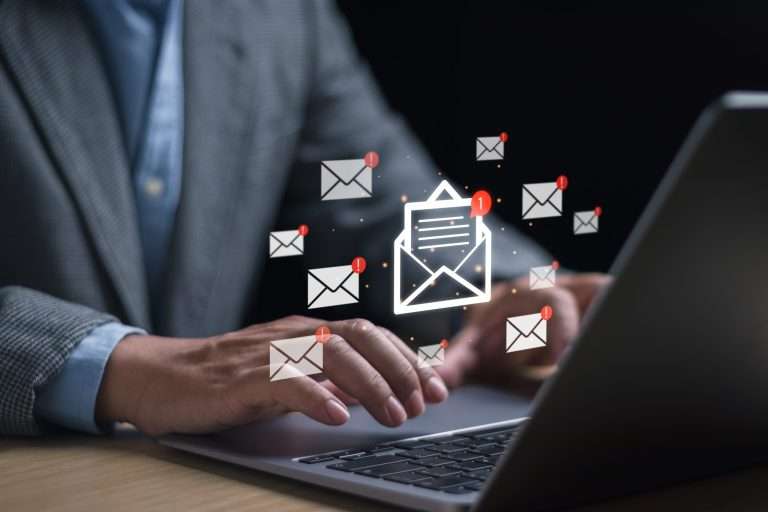 email marketing, someone using their laptop for emails